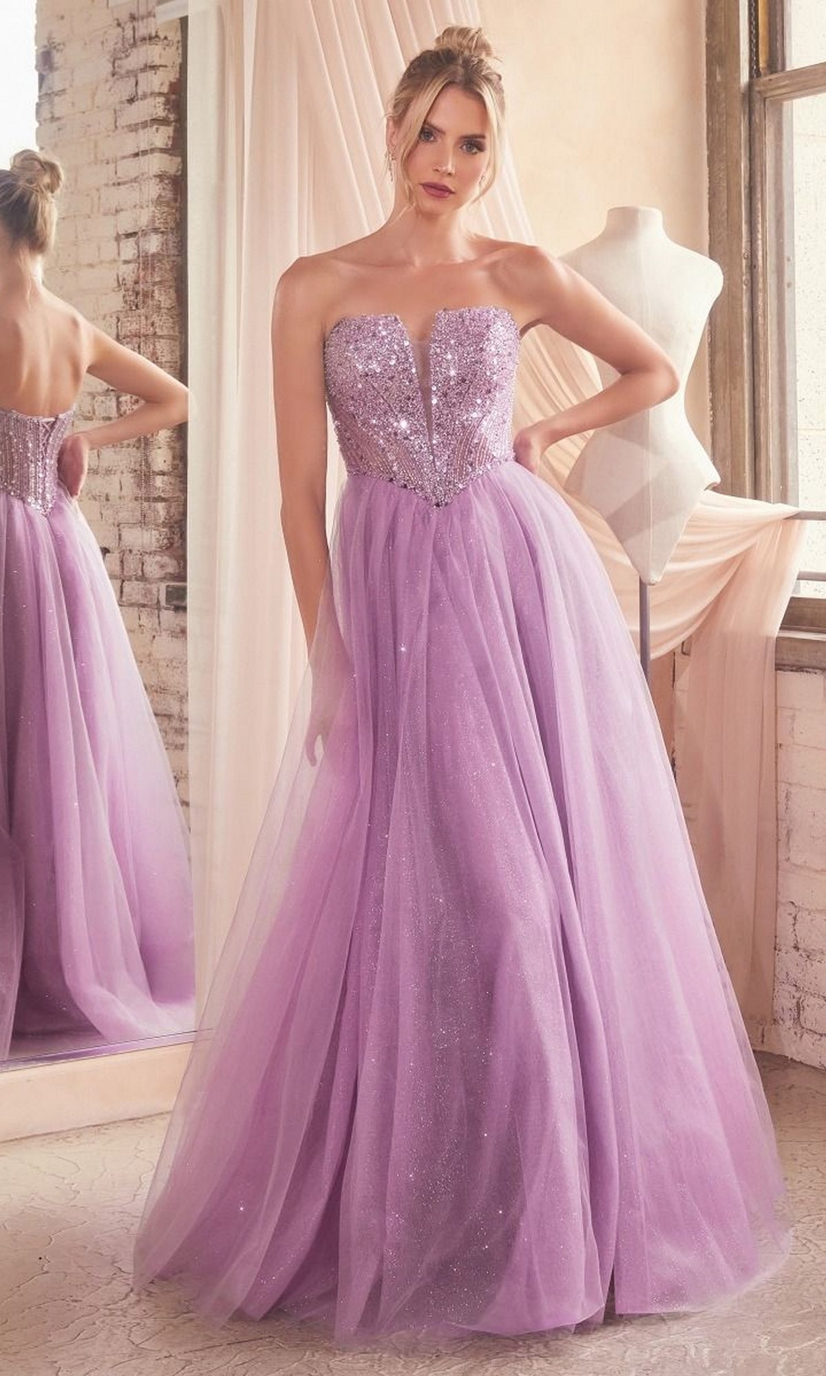 Indoors, a woman wears the Lace-Up Strapless Long Glitter Prom Dress CD0217—a lavender gown with a sequin bodice and tulle skirt; a mannequin and window are visible in the background.